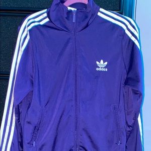 a purple adidas sweater
